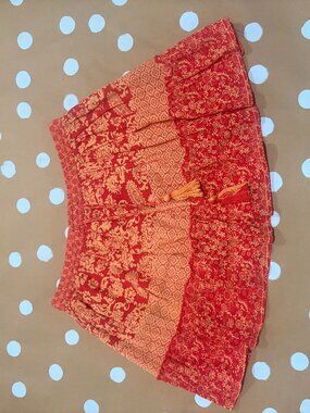 Anthropologie Raga Hard Lovin Red and Orange Print Mini Skirt Size Small
